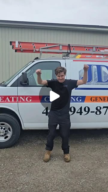 The JD Indoor Comfort crew warming up with dance moves before the day's jobs