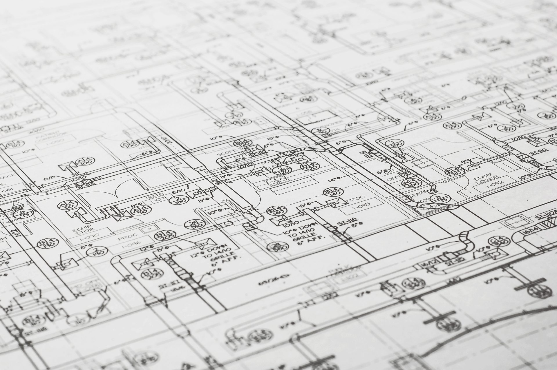 Detailed commercial mechanical drawings showing ductwork, diffusers, and equipment layouts for an HVAC build-out