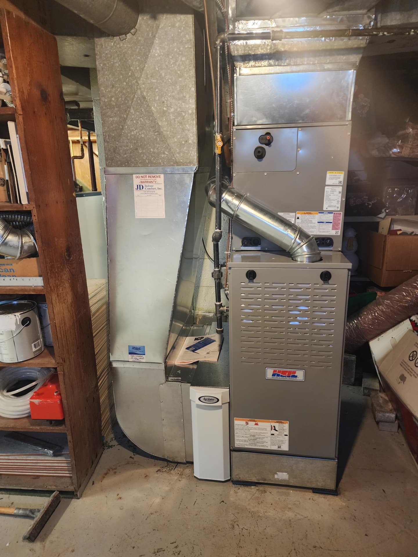 New high-efficiency furnace with Aprilaire whole-home air cleaner installed by JD Indoor Comfort in a Northeast Ohio basement